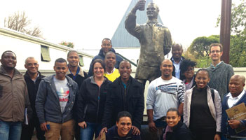Cape Town branch members in front of the Charles Glass statue.